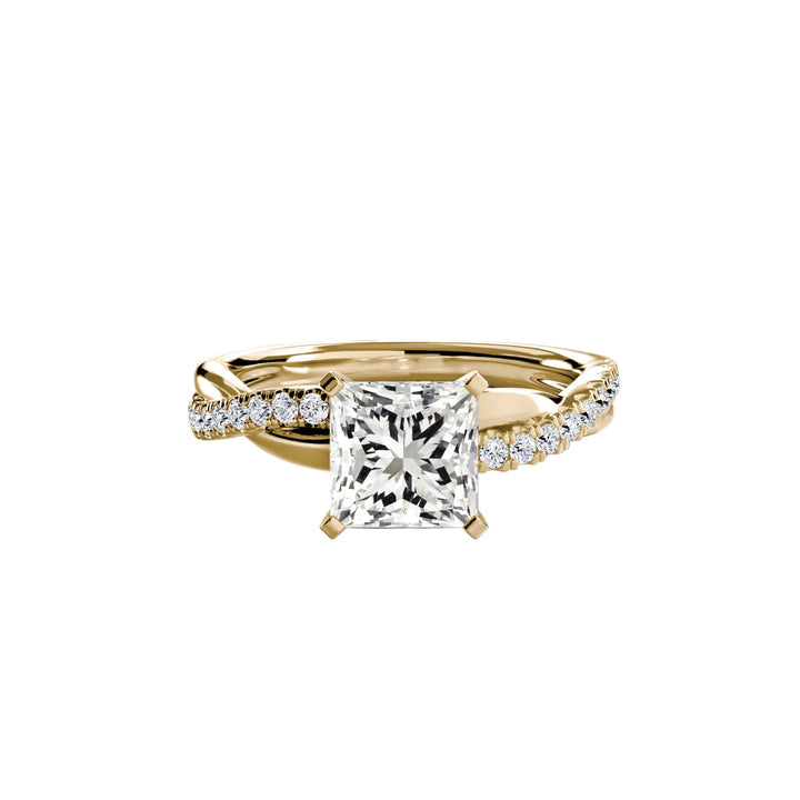 The Emerald Twist Pavé Ring in setting by 18 KARATS