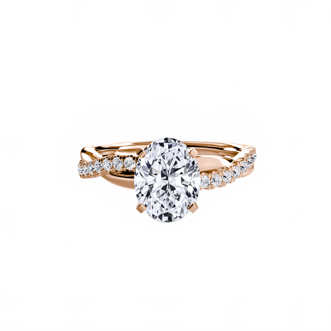 The Emerald Twist Pavé Ring in setting by 18 KARATS