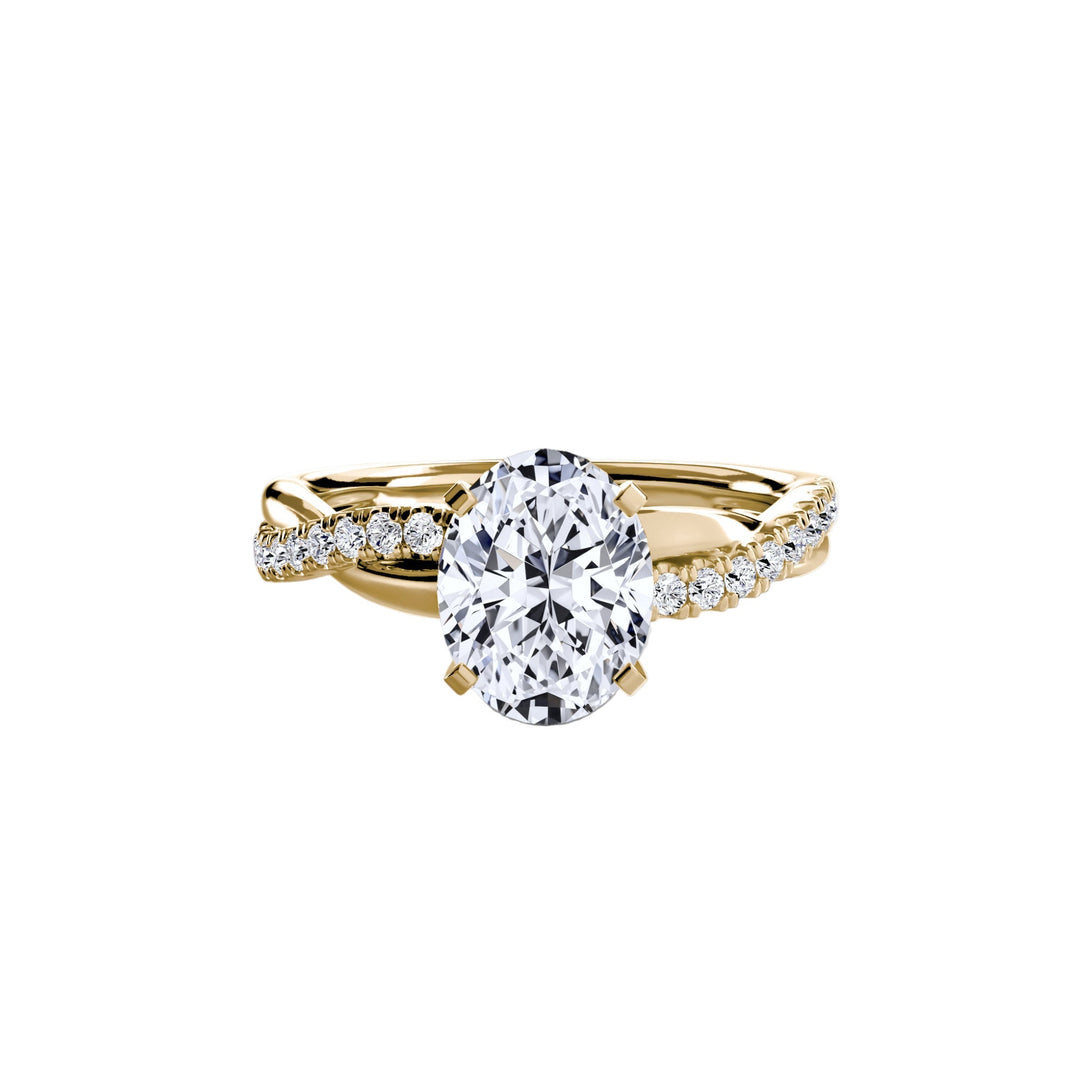 The Emerald Twist Pavé Ring in setting by 18 KARATS