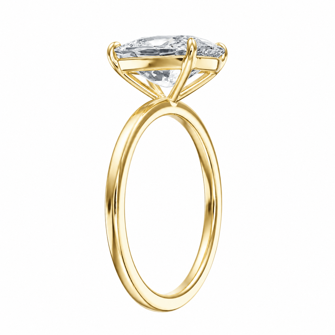 The Grace Elongated Cushion Solitaire Engagement Ring in Ring by 18 KARATS INC.