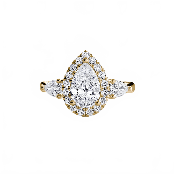 Three - Stone Ring With Halo in setting by 18 KARATS