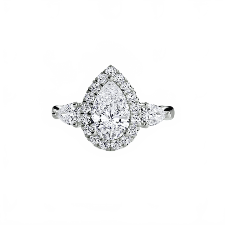 Three - Stone Ring With Halo in setting by 18 KARATS