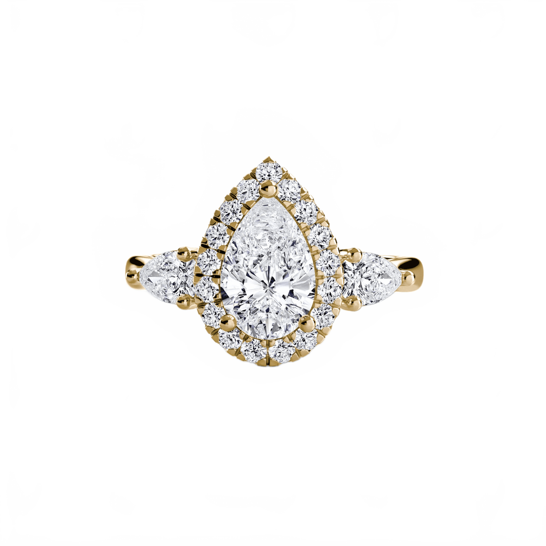 Three - Stone Ring With Halo in setting by 18 KARATS