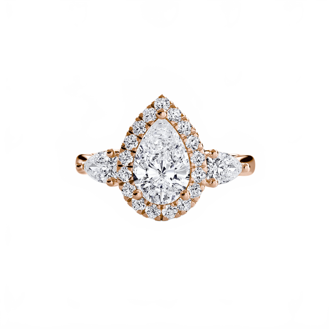 Three - Stone Ring With Halo in setting by 18 KARATS