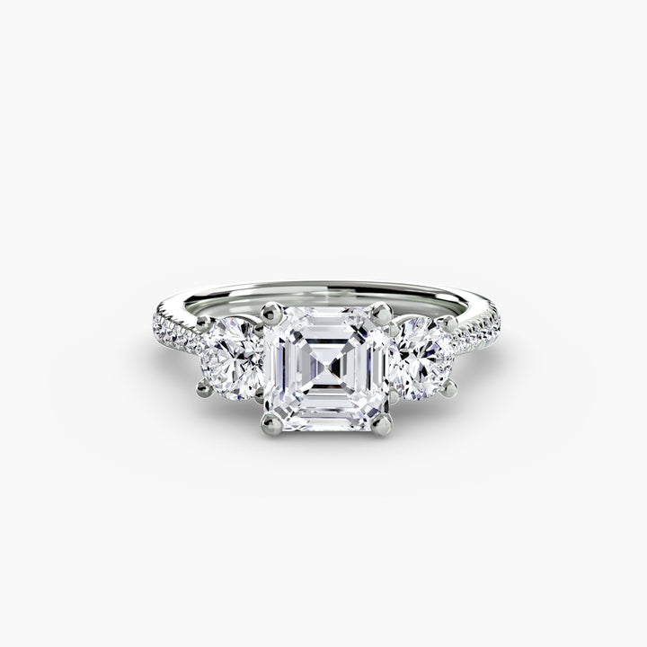 Three - Stone With Pave Band in setting by 18 KARATS